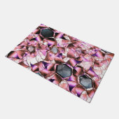 ピンクがかった花弁のような形に囲まれた六角形 ドアマット (アングル)