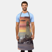 ピンクとオレンジ色の空を持つ海岸灯台 エプロン (着用した状態)