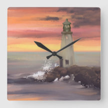 ピンクとオレンジ色の空を持つ海岸灯台