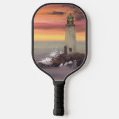 ピンクとオレンジ色の空を持つ海岸灯台 ピックルボールラケット (裏面)