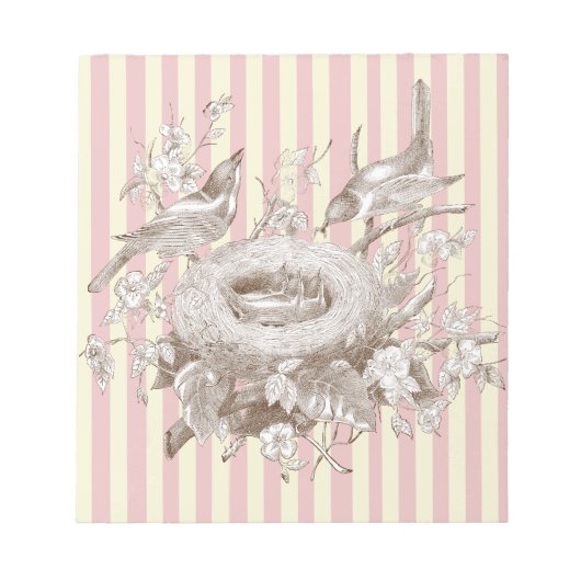 ピンクとクリームの背景のラ・プティ・ファミリー ノートパッド (正面)