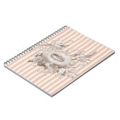 ピンクとクリームの背景のラ・プティ・ファミリー ノートブック (左側)