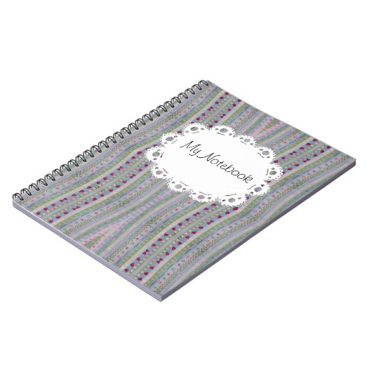 ピンクとグリーンのかわいらしハートパターン ノートブック (左側)