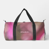 ピンクとタウペシックなカモフラージュモノグラムの ダッフルバッグ (正面)