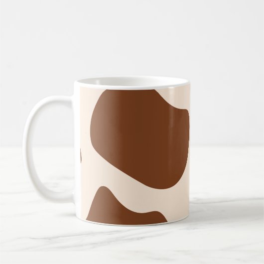 ピンクとブラウンの牛柄プリント コーヒーマグカップ (左)