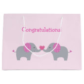 ピンクと白の水玉模様ゾウのベビーシャワー ラージペーパーバッグ (正面)