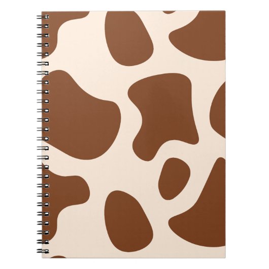 ピンクと茶色の牛のプリント ノートブック (正面)