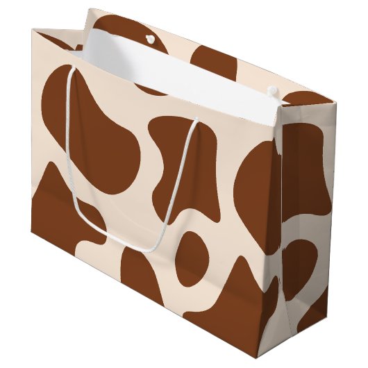 ピンクと茶色の牛のプリント ラージペーパーバッグ (正面アングル)
