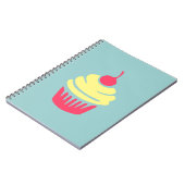 ピンクと黄色のカップケーキとさくらんぼを上に ノートブック (左側)