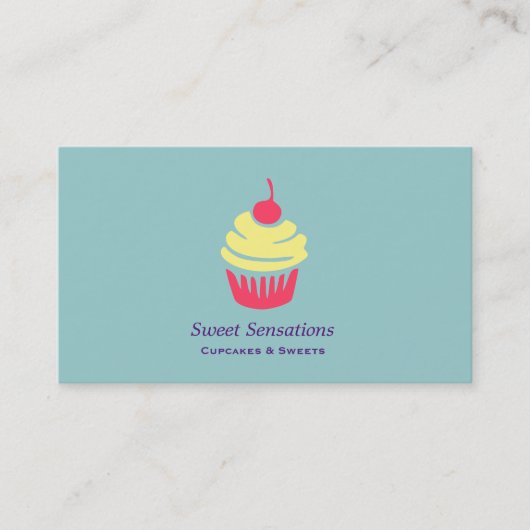 ピンクと黄色のカップケーキとさくらんぼを上に 名刺 (正面)