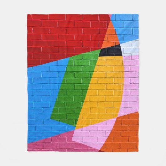 ピンクと黄色の絵を描壁 フリースブランケット (正面)