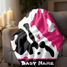 ピンクと黒の牛のプリント