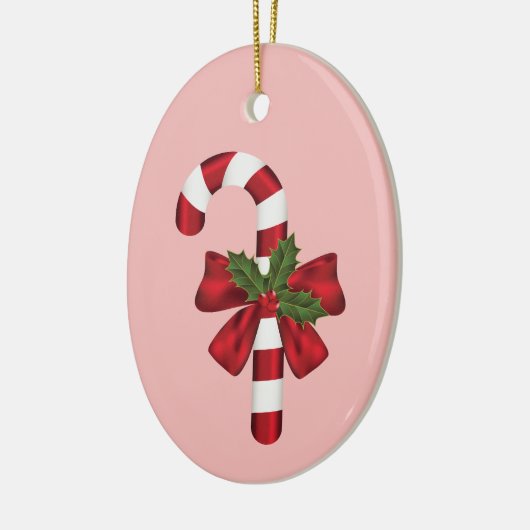 ピンクに弓とクリスマスホリーを付けたキャンディーケーン セラミックオーナメント (左)
