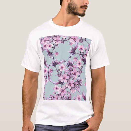 ピンクのさくらんぼの花:水色の背景の枝 Tシャツ (正面)