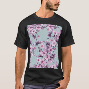 ピンクのさくらんぼの花:水色の背景の枝 Tシャツ