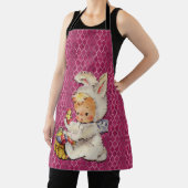 ピンクのエプロンにイースターバニーメタリックの服を着た少年 エプロン (インサイチュ)