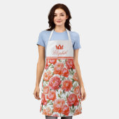 ピンクのオレンジ色の牡丹花柄 | 王冠 エプロン (着用した状態)