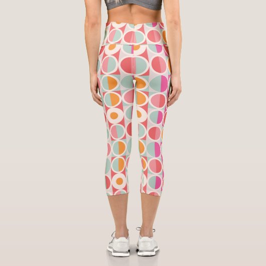 ピンクのオレンジ色の青い幾何学的パターン カプリレギンス (裏面)
