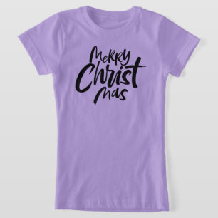 ピンクのキリスト教のモットーのキリストのクリスマスのレタリング Tシャツ