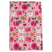 ピンクのクリスマスパターン ミディアムペーパーバッグ (正面)