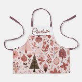 ピンクのクリスマスパターン | 名前入り子供用エプロン エプロン (正面)