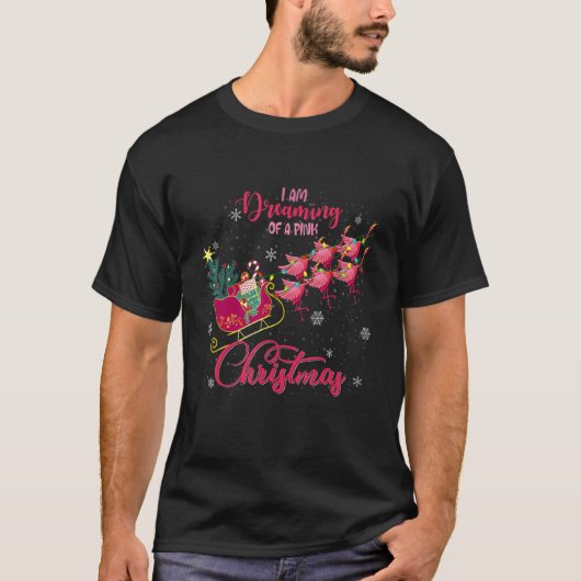 ピンクのクリスマスフラミンゴの引っ張りを夢見ている Tシャツ (正面)