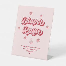 ピンクのクリスマスベビーシャワーおむつラッフル 台座サイン