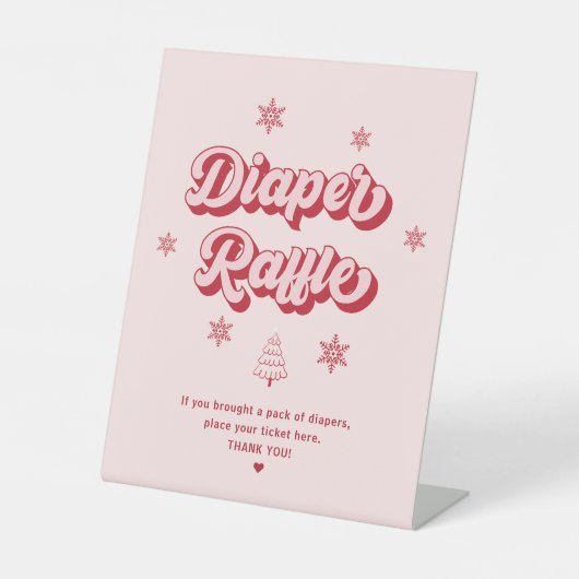ピンクのクリスマスベビーシャワーおむつラッフル 台座サイン (正面)