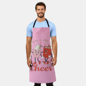 ピンクのクリスマス応援レトロを飲む エプロン (着用した状態)