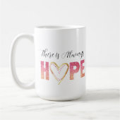 ピンクのグリッターと金ゴールドの「There is Always HOPE」 コーヒーマグカップ (左)