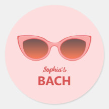 ピンクのサニー、キャットアイサングラス、フェミニンなサングラス