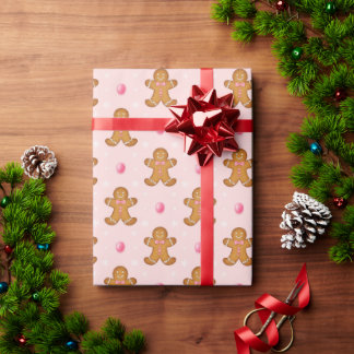ピンクのジンジャーブレッドマン かわいいパステル クリスマス ラッピングペーパー