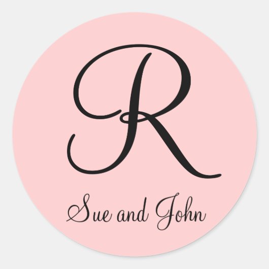 ピンクのステッカーの名と最後のイニシャルブラック ラウンドシール (正面)