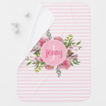 ピンクのストライプおよび花のベビーブランケット