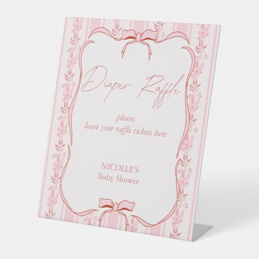 ピンクのストライプは赤ちゃんシャワーおむつラッフルサインを弓 台座サイン (正面)