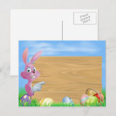 ピンクのチョコレートの卵はイースターバニーにサイン シーズンポストカード (正面/裏面)