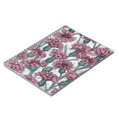 ピンクのトウモロコシの花、白い上に野生の花 ノートブック (左側)