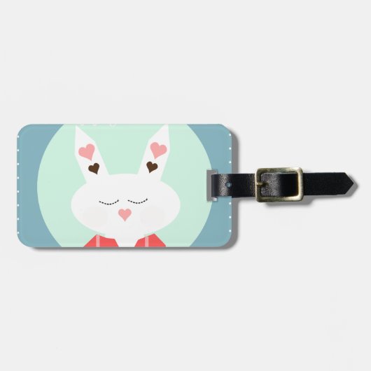 ピンクのハートを持つキュートな白いイースターバニー ラゲッジタグ (正面横)