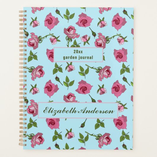 ピンクのバラの表面パターンデザインオン青プランナー プランナー手帳 (正面)