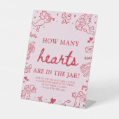 ピンクのバレンタイン ハートがいくつあるかな？ベイビーシャワー 台座サイン (正面)