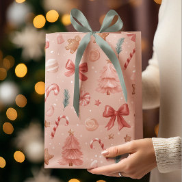 ピンクのフェスティブクリスマス+ウィズミカルパターンギフトバッグ ミディアムペーパーバッグ
