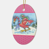 ピンクのフラミンゴが冬のクリスマスのために南に向かう セラミックオーナメント (左)