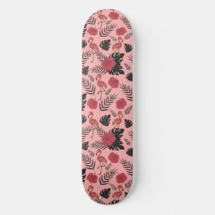 ピンクのフラミンゴの継ぎ目のないパタ葉ーンと花 スケートボード