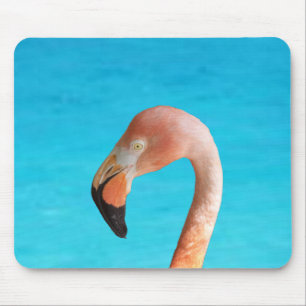 ピンクのフラミンゴ顔の青い水に対して マウスパッド
