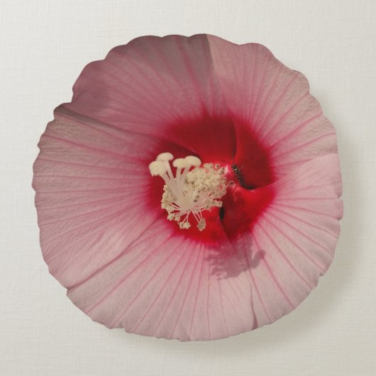 ピンクのフラワーブラシ仕上げポリエステルラウンドスロークッション ラウンドクッション (正面)