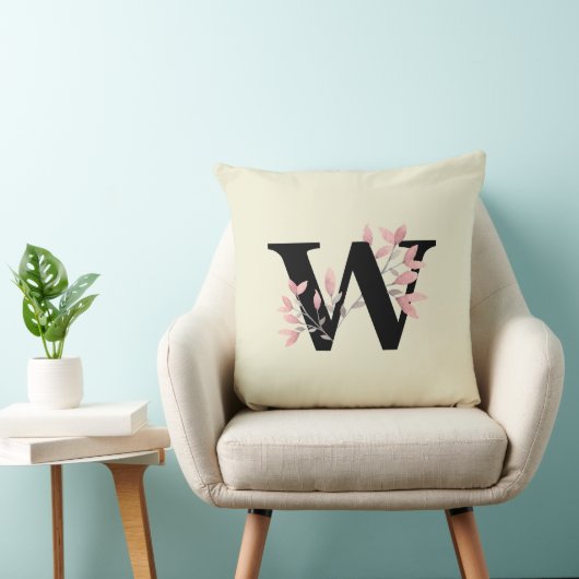 ピンクのフローラスプレー付きモノグラム クッション (椅子)