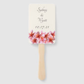 ピンクのプルメリアの花を持っている手のファン ハンドファン (裏面)