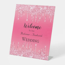 ピンクのラメが滴る個性的な結婚式ウェルカムボード