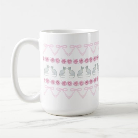 ピンクのリボンとグレーの子猫 コーヒーマグカップ (左)