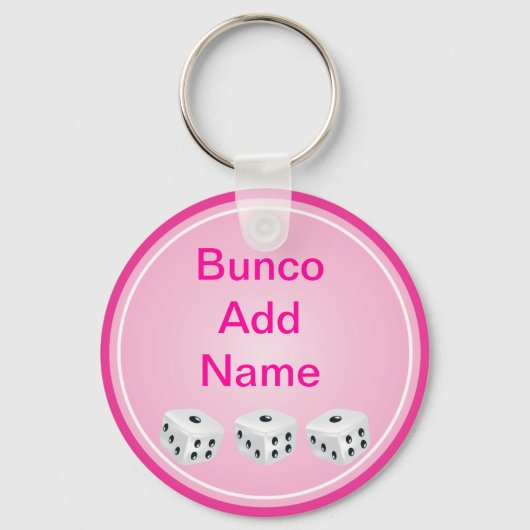 ピンクの円がカスタマイズ可能なサイコロ キーホルダー (正面)